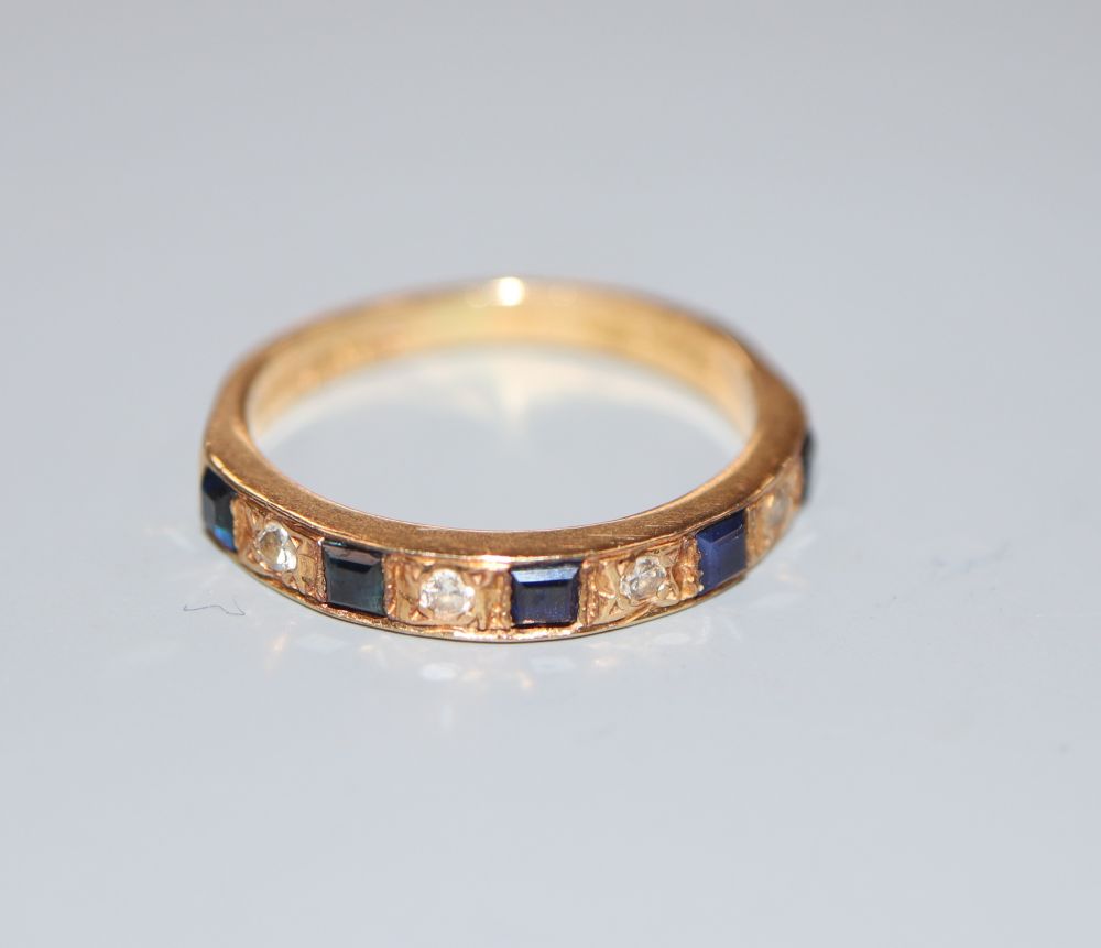 A 1970s 18ct gold, five stone sapphire and four stone diamond set half hoop ring, size K, gross 2.7 grams.
